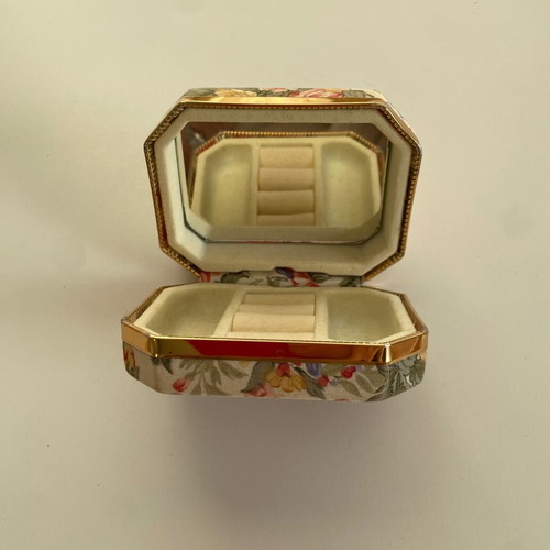 Vintage jewelry box used with mirror and floral fabric design