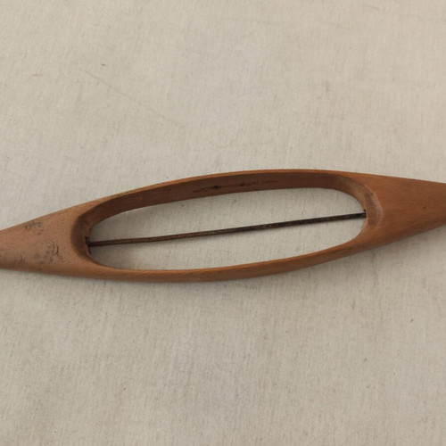 Wooden weaving shuttle used in good condition