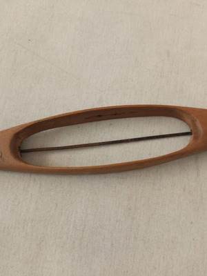 Wooden weaving shuttle used in good condition