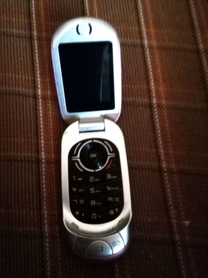 Alcatel OT-S319TCT used pink phone for collectors without charger