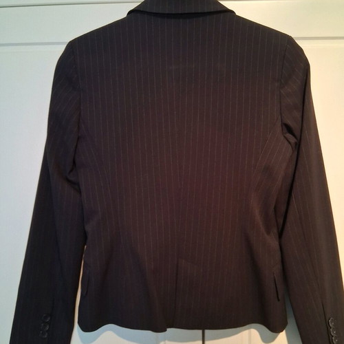 TE QUERO Small suit with fitted jacket and low-rise trousers, like new