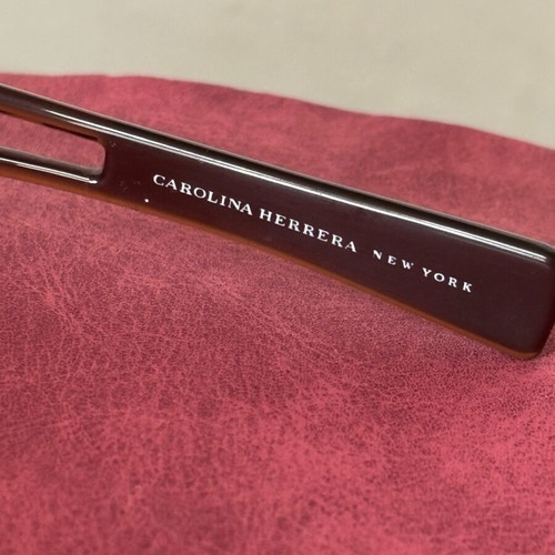 Carolina Herrera sunglasses used, black and brown