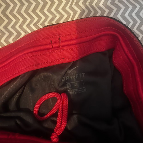 Nike Dri Fit NBA shorts, red and black