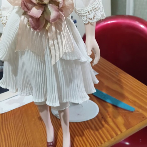 Porcelain doll in excellent condition