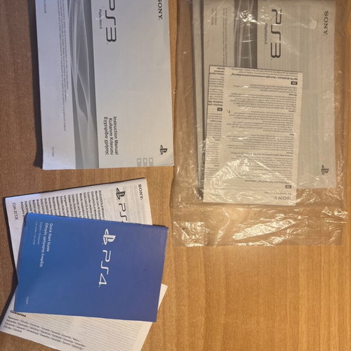 PS3 and PS4 manuals, one sealed