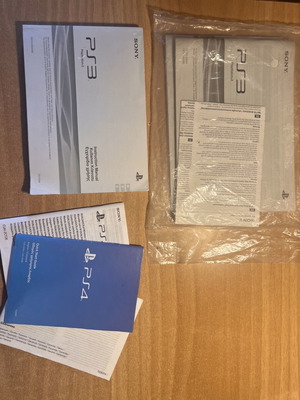 PS3 and PS4 manuals, one sealed