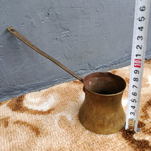 Old cezve handmade with engraved handle, used