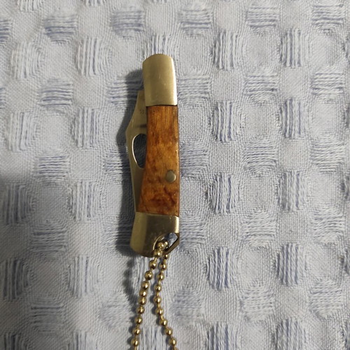 Pocket knife like new, silver and brown, 7 cm