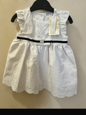 White lace dress for 12 months new from Evita