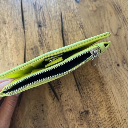 Axel wallet used in bright lime color