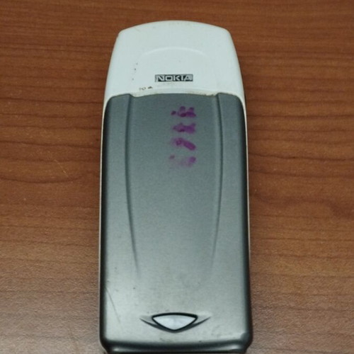 Nokia 6100 used, unknown condition, gray