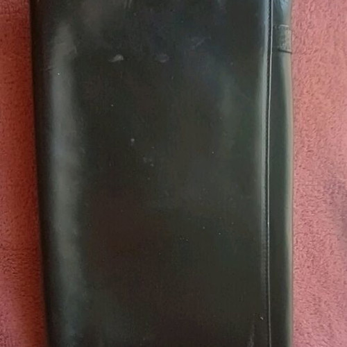 Leather envelope bag used, black handheld from Greek workshop