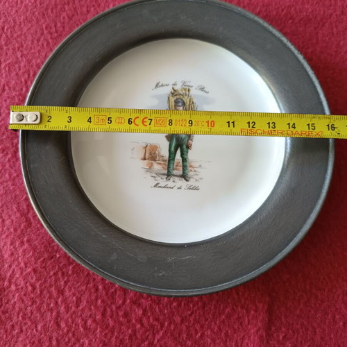 Decorative porcelain plate with pewter base like new