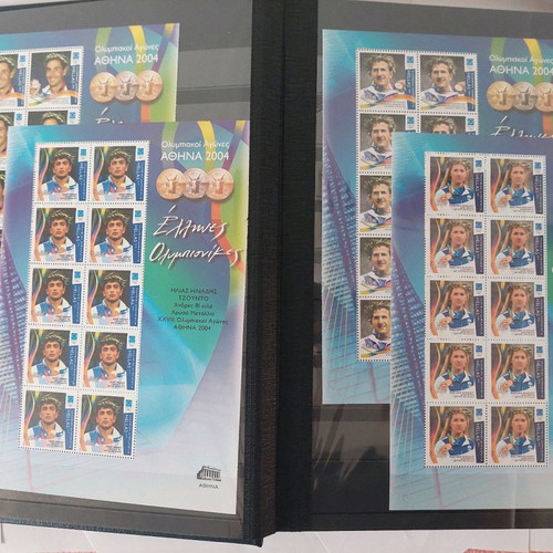 Leuchtturm stamp album with unused 2004 Olympic Games stamps used
