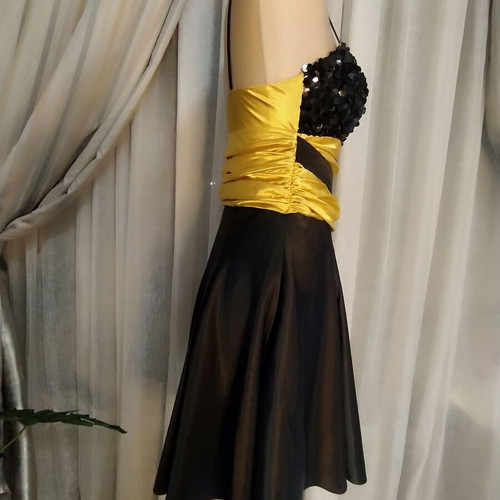 Evening dress like new with black sequins and yellow fabric