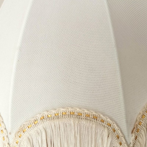 Vintage porcelain table lamp with fabric white shade and fringes used