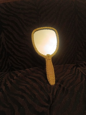 Vintage hand mirror 1960s with fleur-de-lis fabric trim, 29 cm