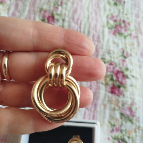 H&M gold-tone earrings like new with two connected circles design