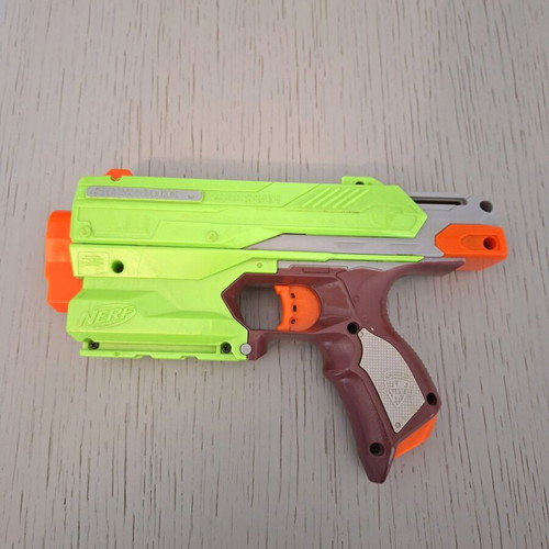 Nerf Zombie Strike Sidestrike Blaster used with two small Nerf and magazine