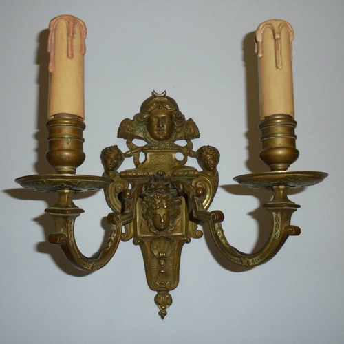 Pair of bronze antique two-light wall sconces, late 19th century