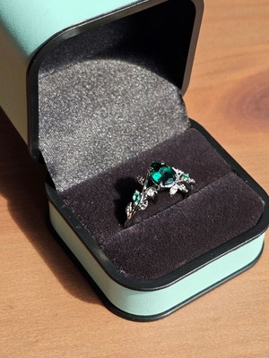14K White Gold Engagement Ring with Emerald and Moissanite