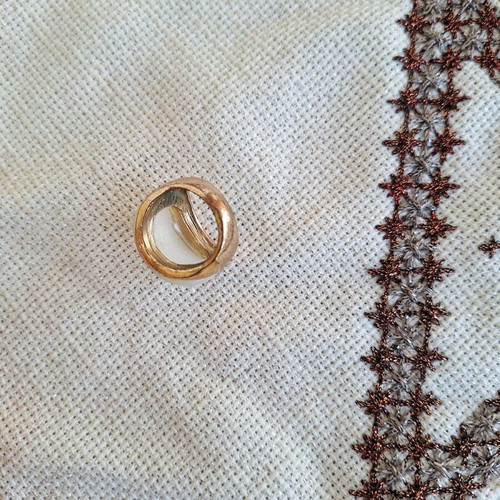 Ring with cat's eye stone size 18 used, metal and stone