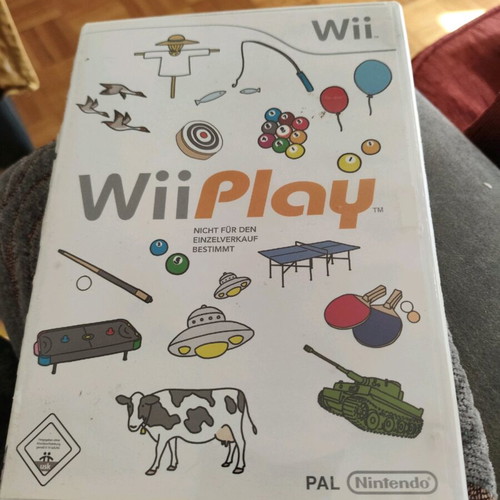Wii Play game for Nintendo in German with torn plastic wrap