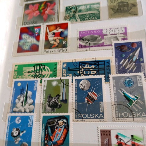 Two stamp albums with stamps from around the world
