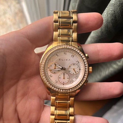 Elixa women's watch like new, gold bracelet with crystals