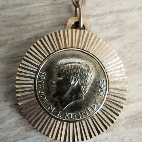 Kennedy keychain used, gold color