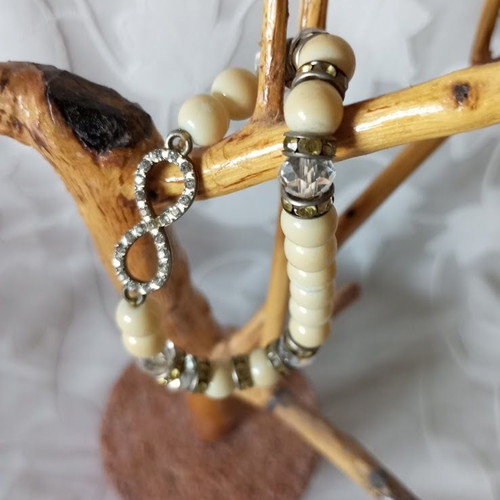 Bracelet with beads and infinity symbol new, cream and silver