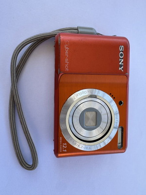 Sony DSC-S2100 Cybershot camera used for parts or repair, orange