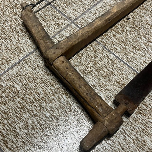 Old saw used from 1920-30 era museum piece