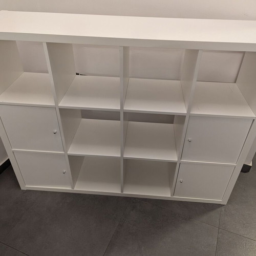 IKEA Kallax white shelving unit with 4 inserts