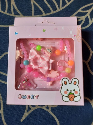 Complete children's jewelry set with necklace, hair clips, and bows