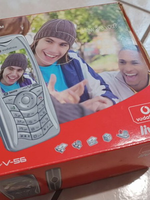 SAGEM My V-56 used with charger and hands free headset