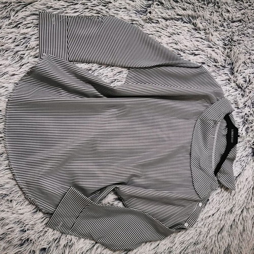 Blouse with smile neckline like new, striped black and white