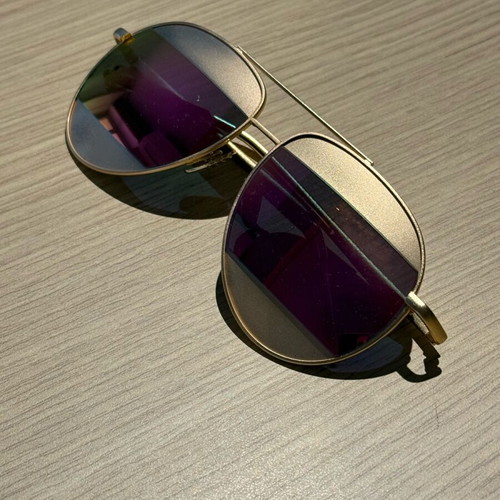 Luna Australia sunglasses used, gold with purple-pink lenses