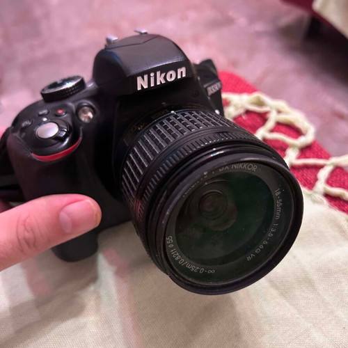 Nikon DSLR D3300 camera like new with lens, 2 batteries, charger, and card