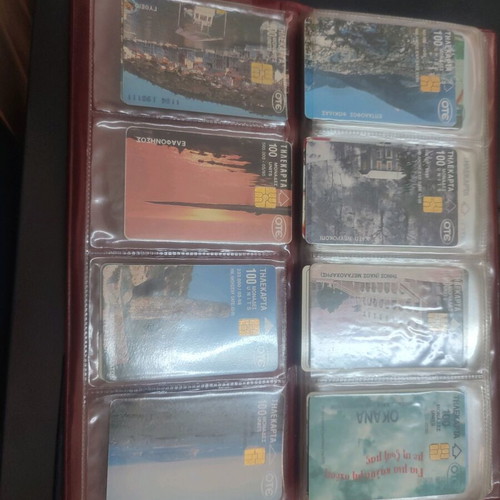 Phone cards used, album with 66 pieces