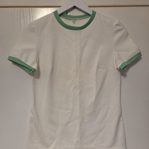 White blouse with green details, like new