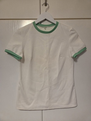 White blouse with green details, like new