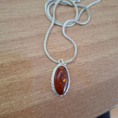 Women's oval pendant with amber and silver chain like new