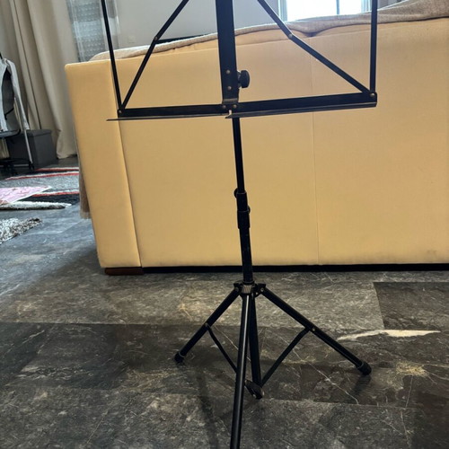 Music stand, guitar floor stand and guitar footrest used
