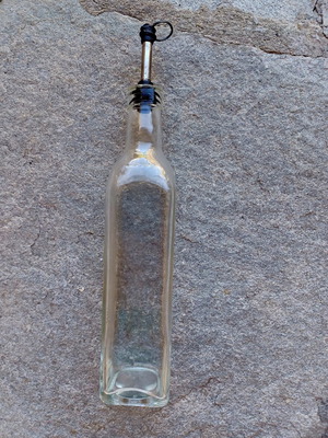 Glass bottle with pour spout for oil and vinegar used