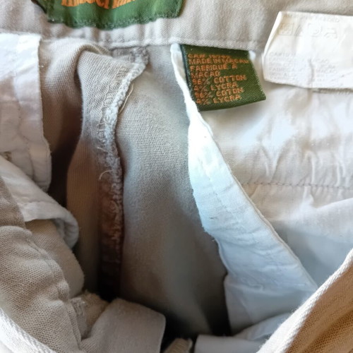 Timberland men's beige pants with 6 front and 2 back zip pockets, size 34