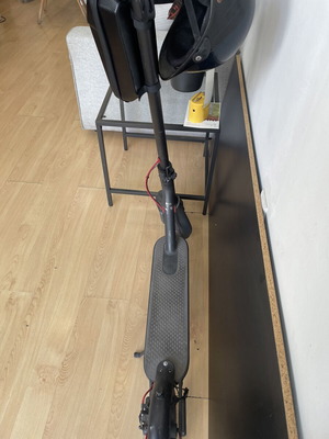 Xiaomi M365 electric scooter with custom firmware and 10-inch wheels