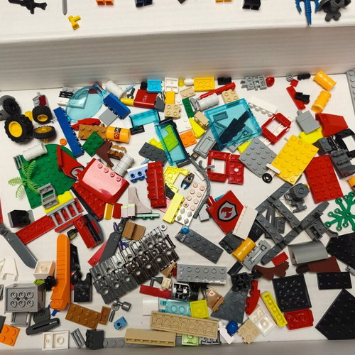 Lego lot like new with figures, weapons, and bricks