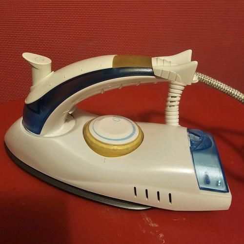 Travel iron new