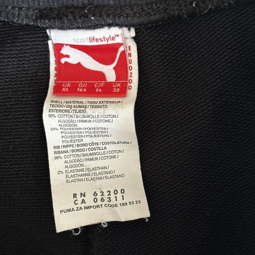 Puma kids' bottoms used, size 164 cm, black